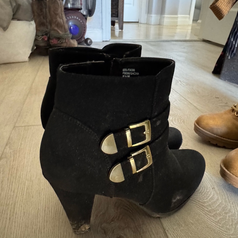 Stylish Black Ankle Boots with Gold Buckles
